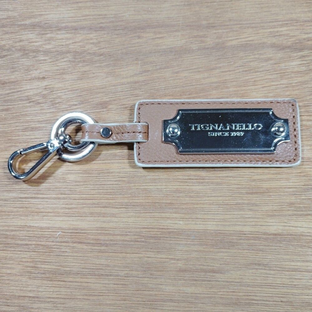 Tignanello Leather & Metal Logo Tag Keychain Purse Charm Accessory Tan EC
